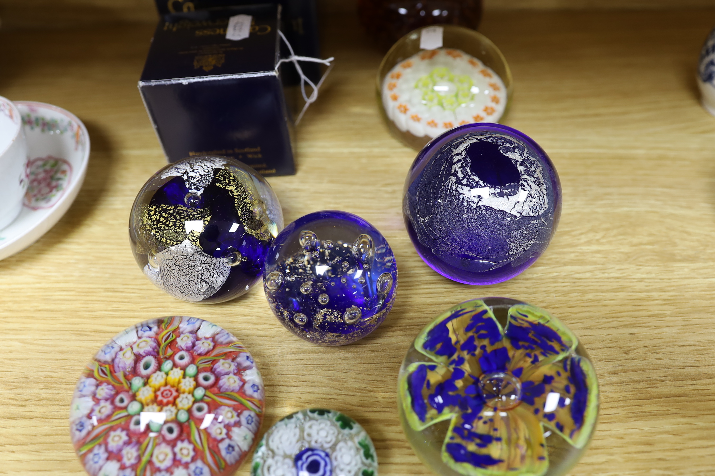 A selection of thirteen mixed decorative paperweights